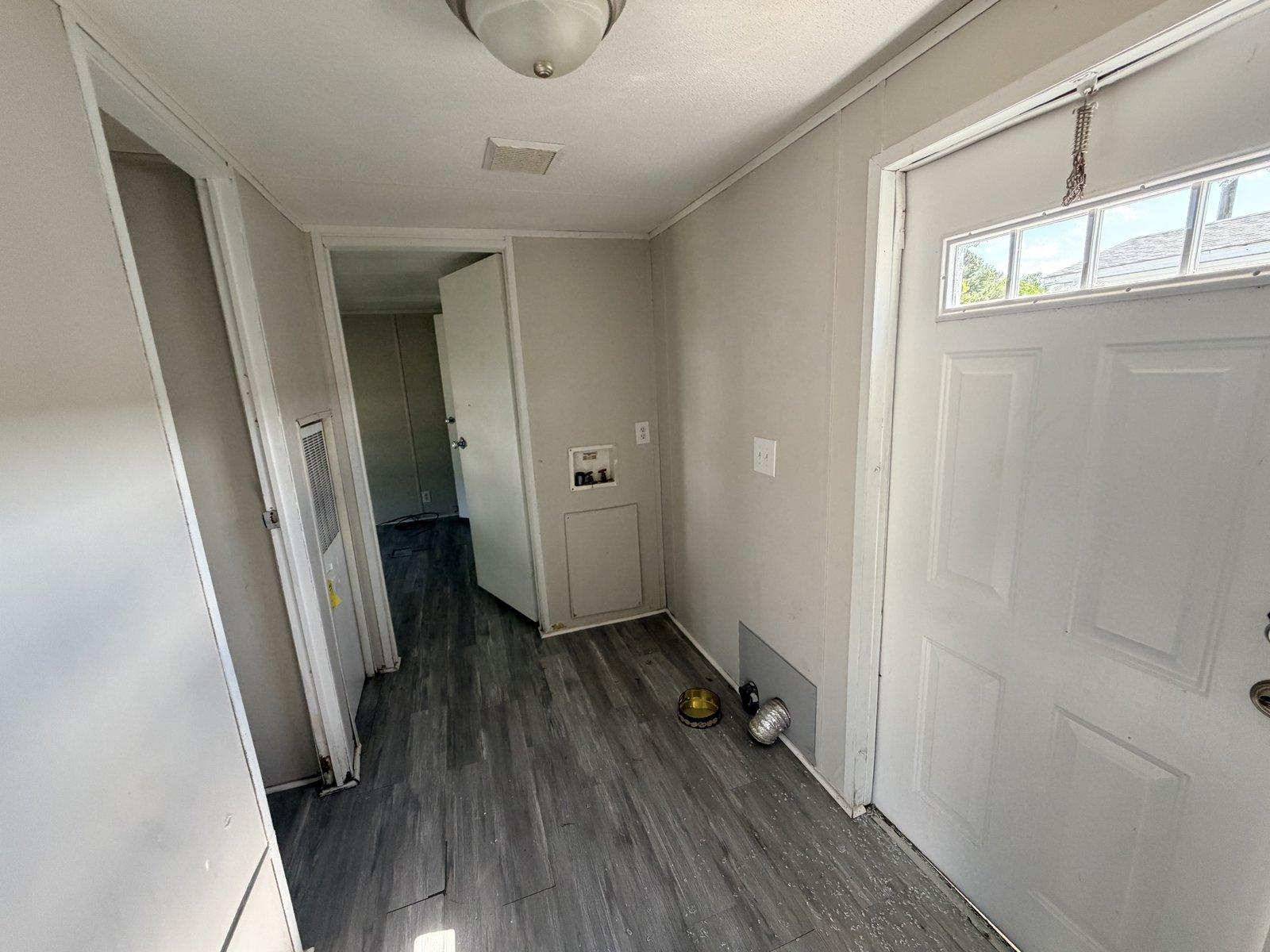 Hallway with laundry alcove