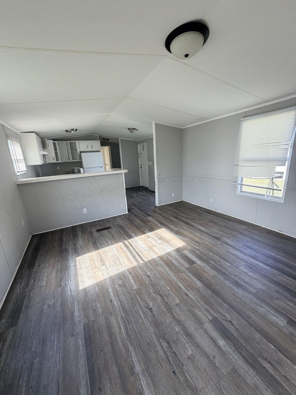 Living room toward kitchen